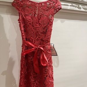 Brand new pretty pink Lacey looking party dress, built in chest support, size 2